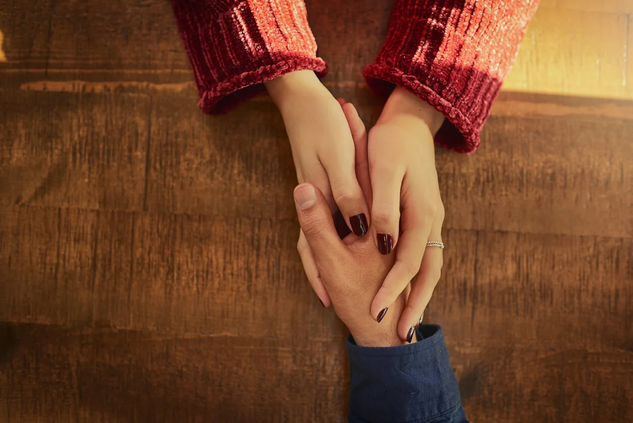 holding hands with wrongful death trial attorney